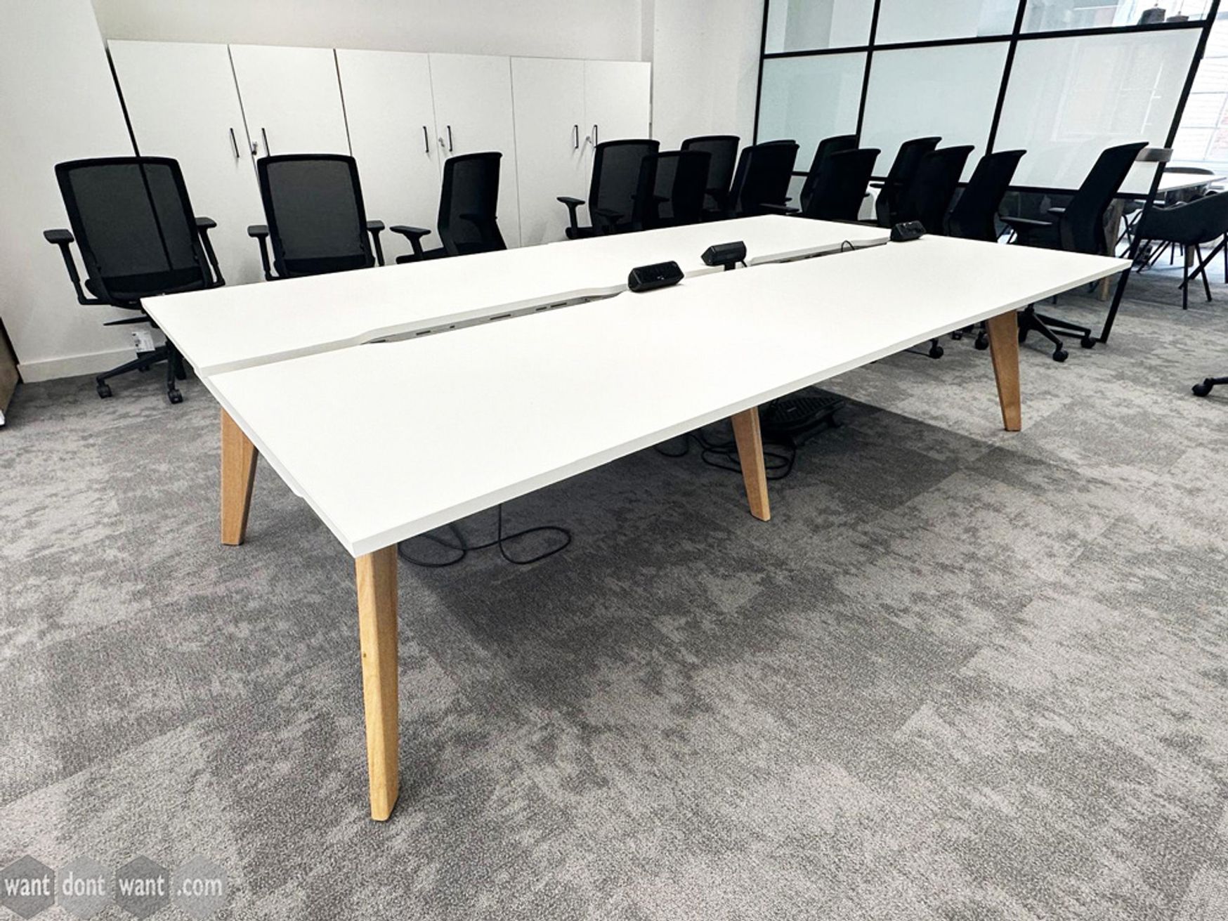 Used 1400mm bench desks with white tops and wooden legs