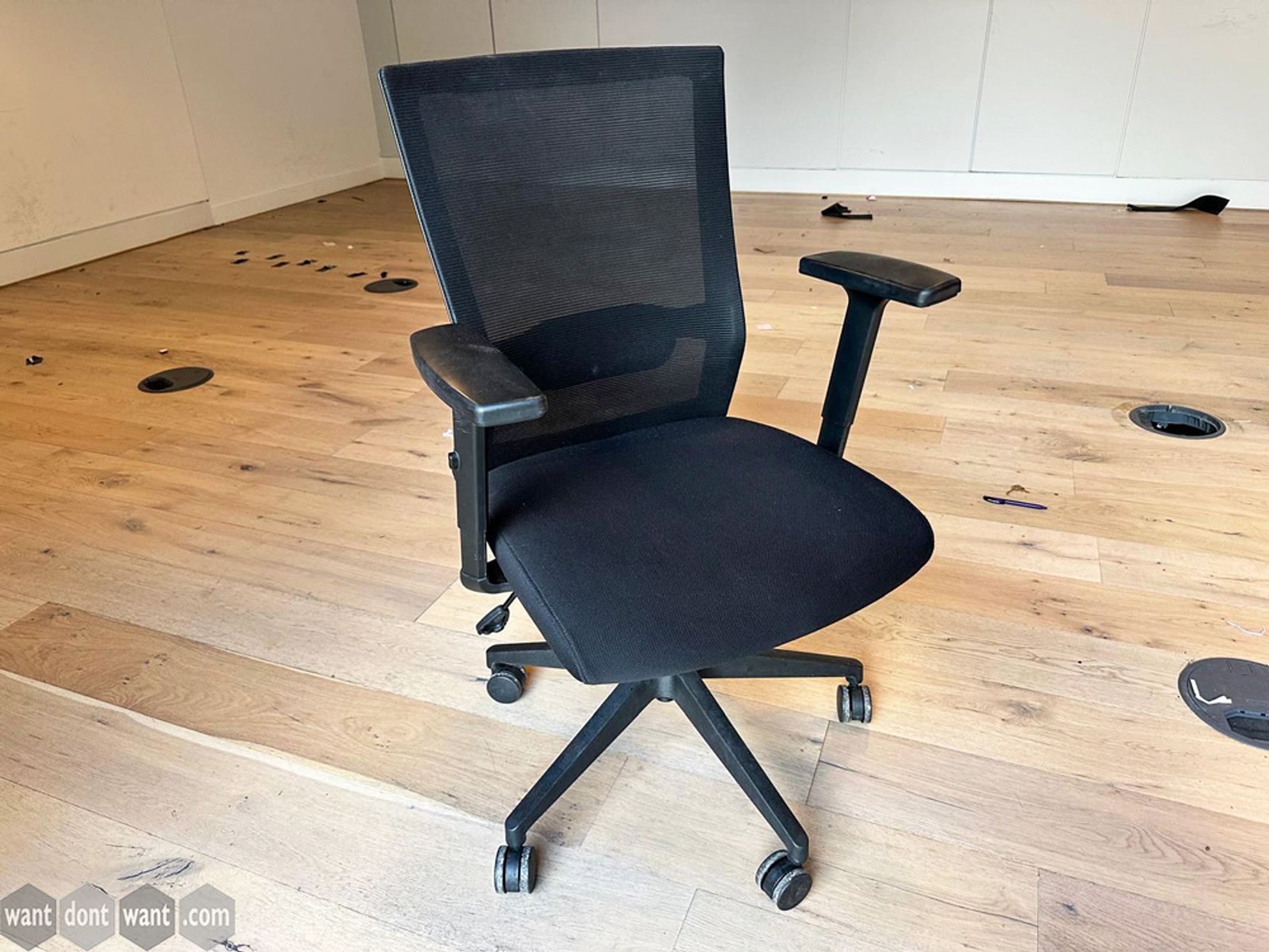 Used black task chair with lumbar support