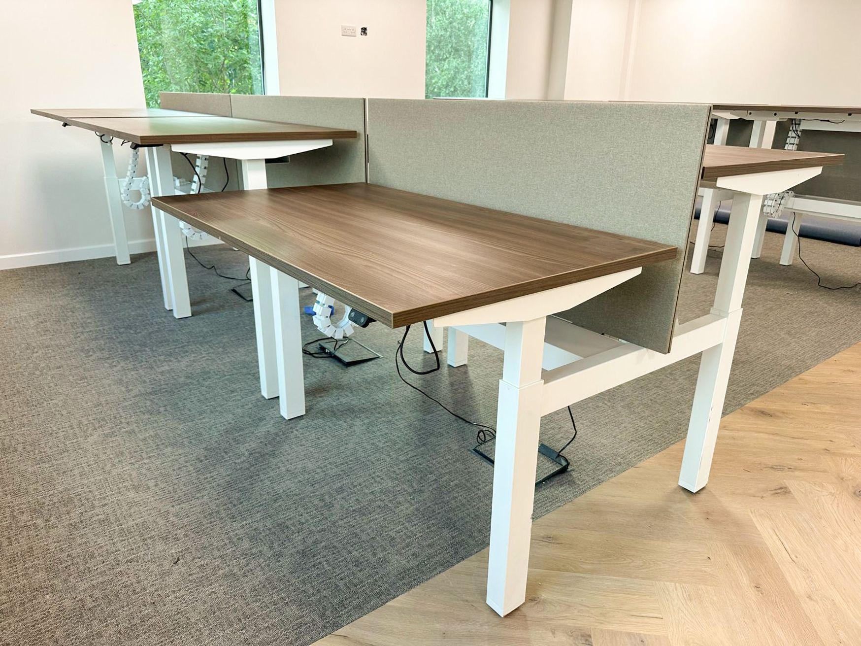 Used 1375mm 'Task' electric Sit/Stand back-to-back workstations 