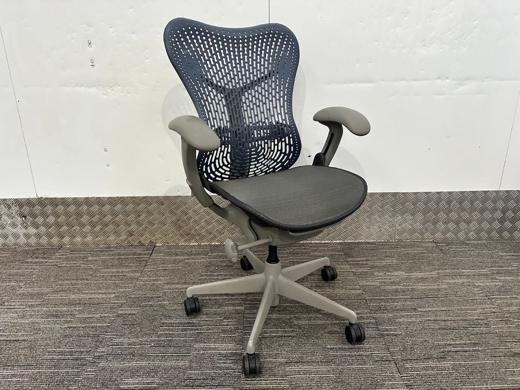 Used Herman Miller Mirra in blue and grey with Adjustable Lumbar 
