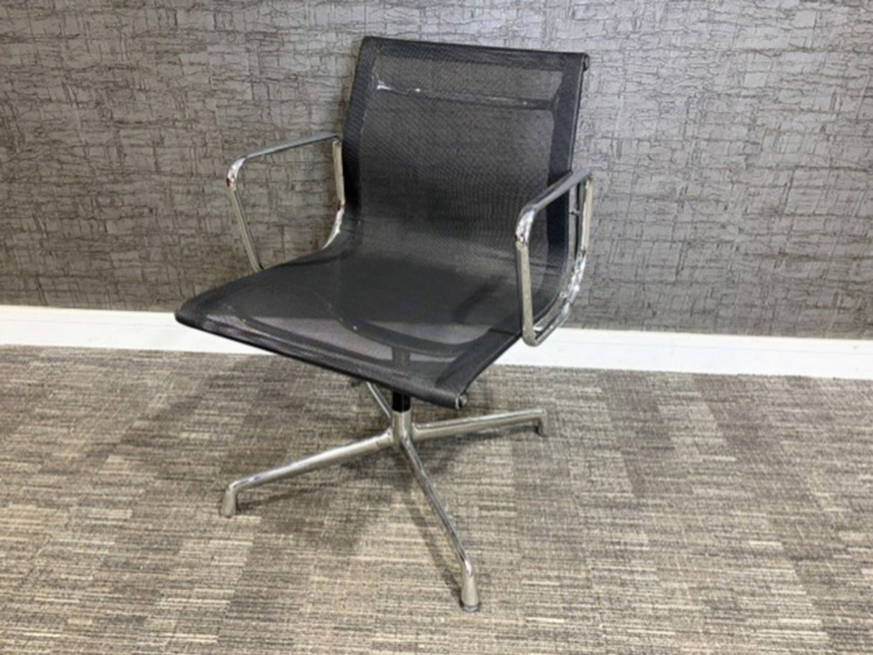 Used ICF Eames mesh chairs