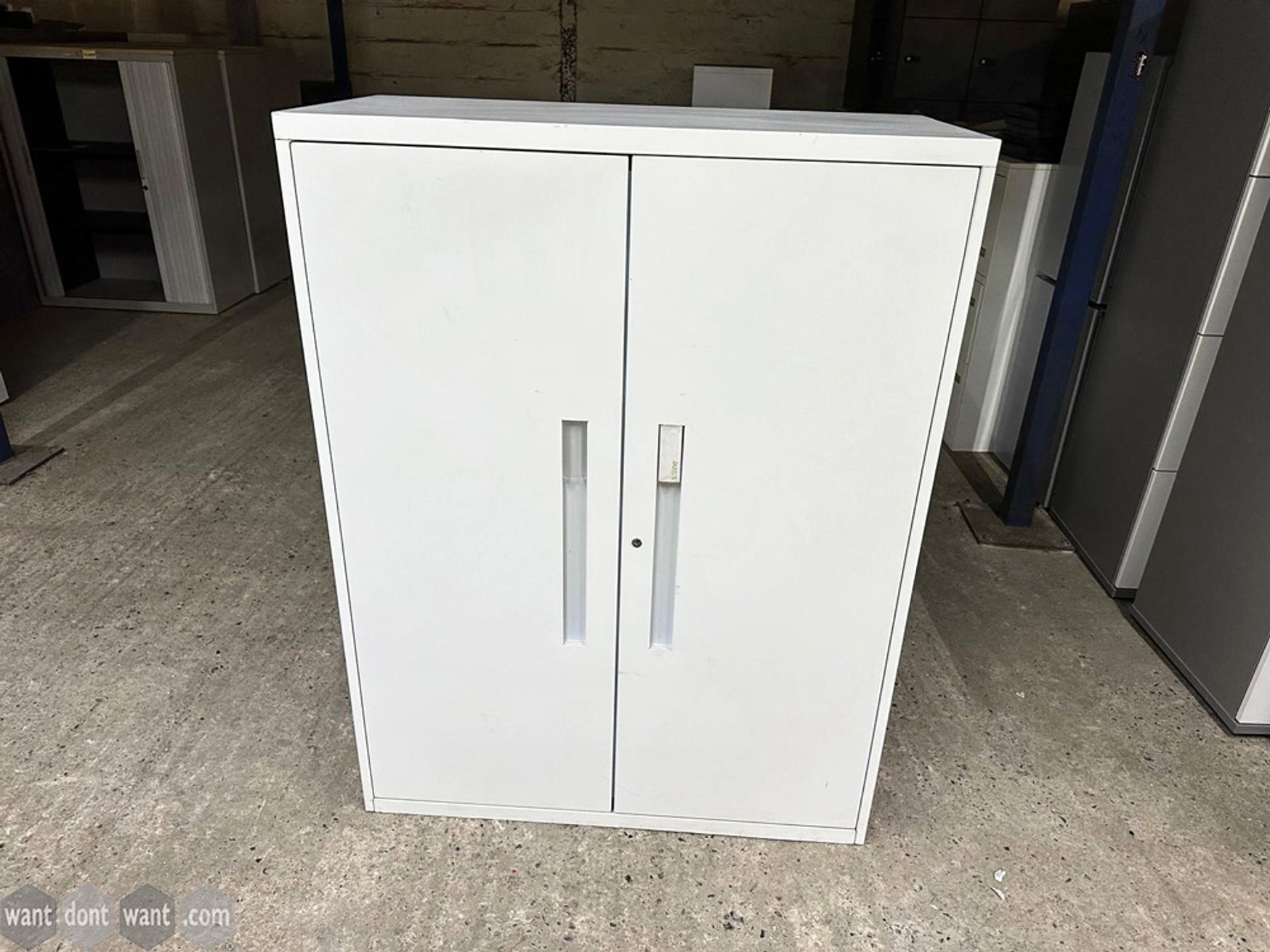 Used white double door cupboard with 2 shelves