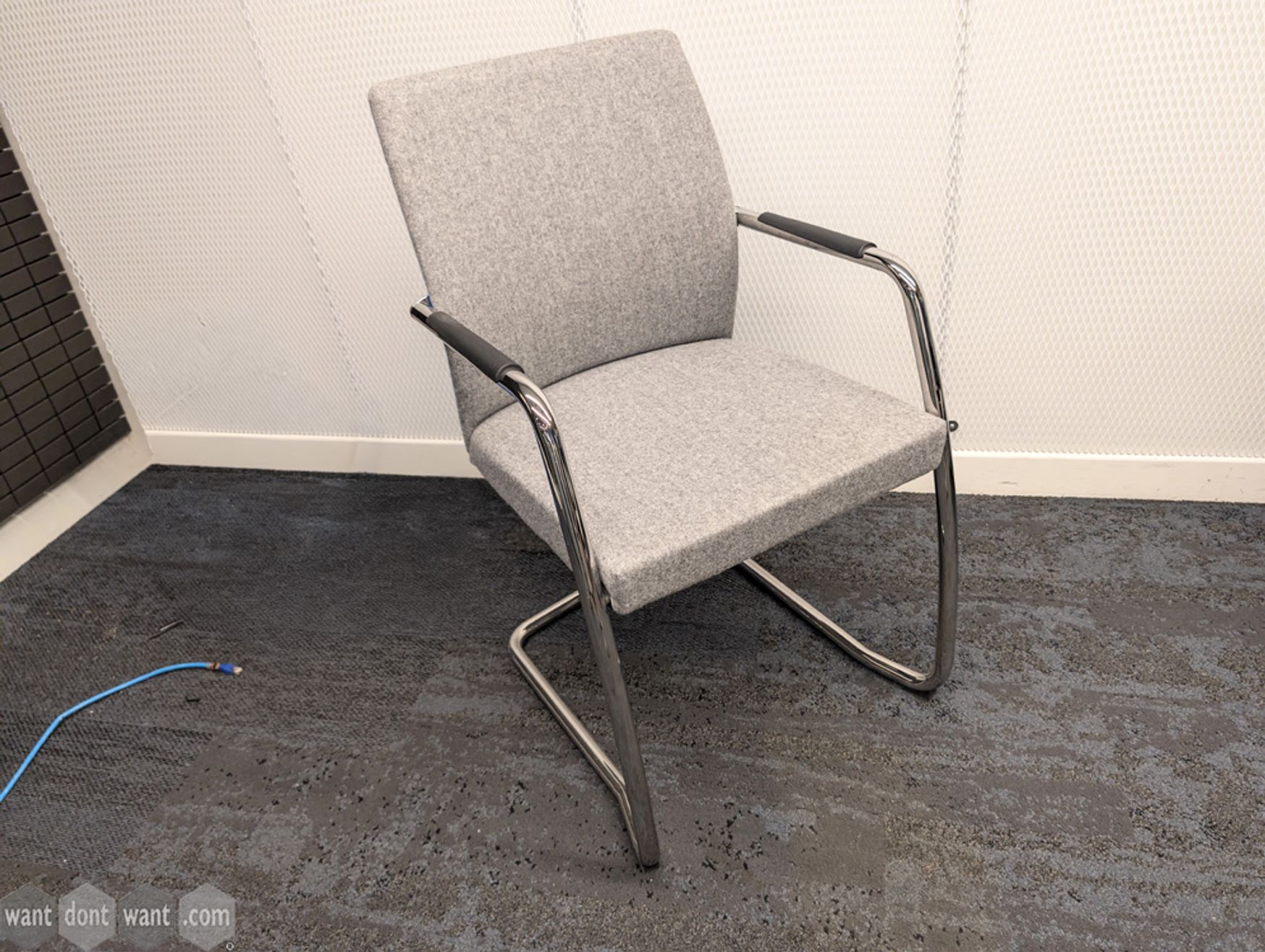Used Ocee Design cantilever chair with grey and blue upholstery
