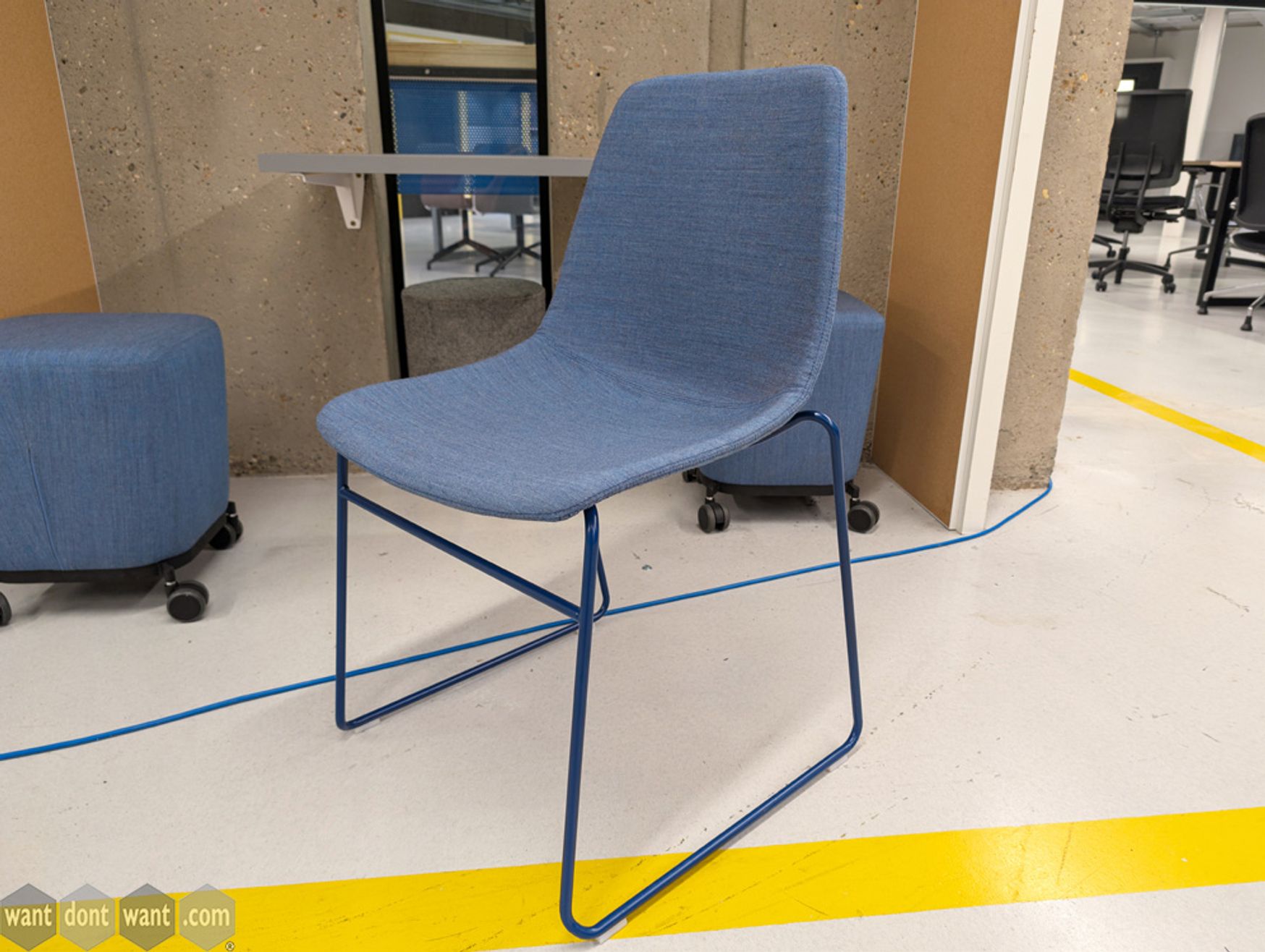 Used Chair with blue upholstery and blue sled base