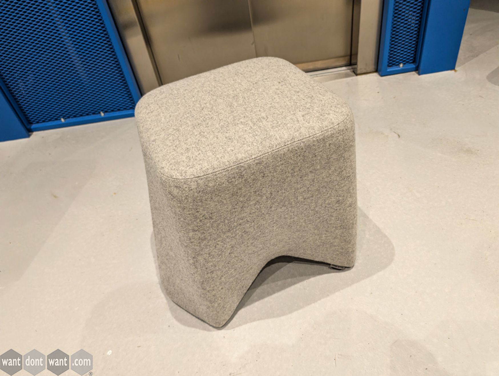 Used Boss Design 'Hoot' stool upholstered in light grey fabric