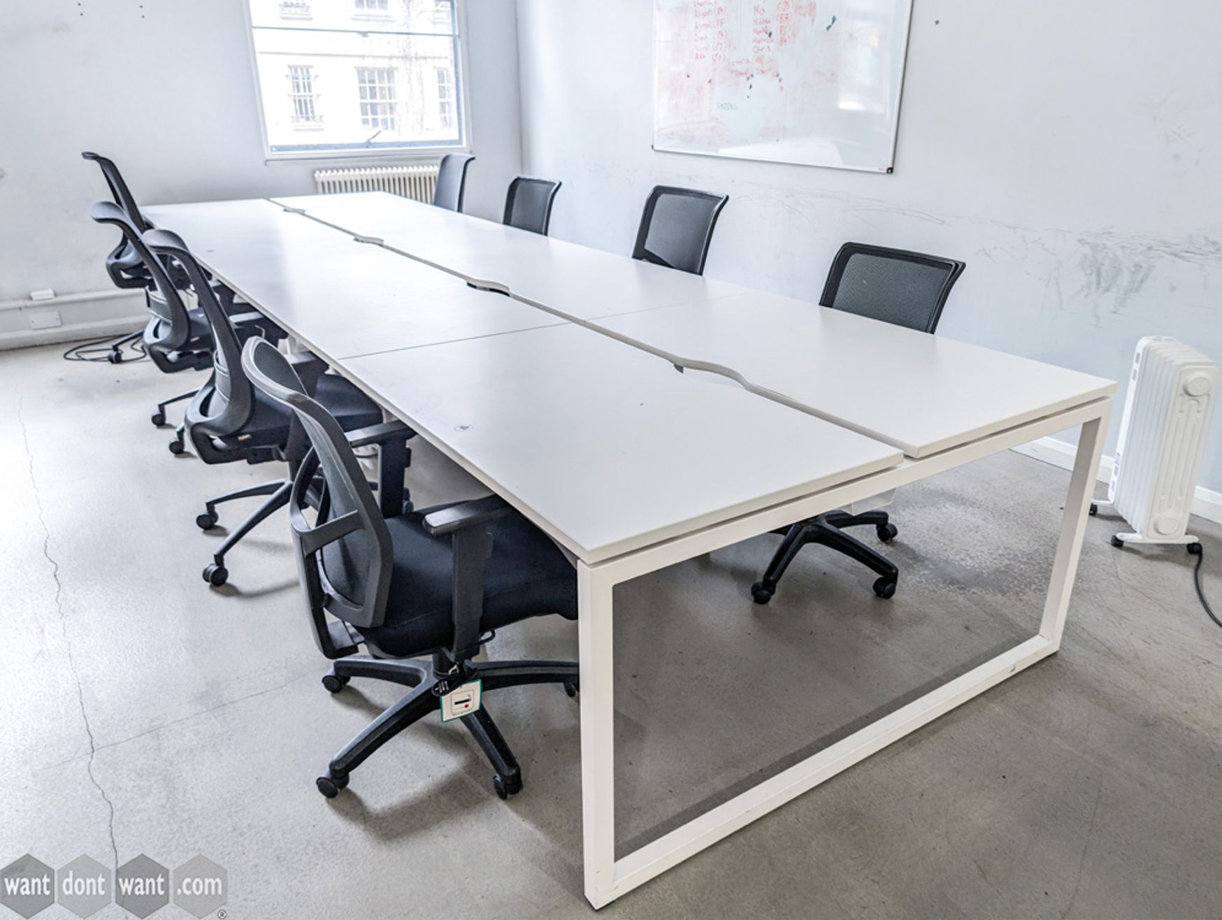 Used O-frame desks in various configurations