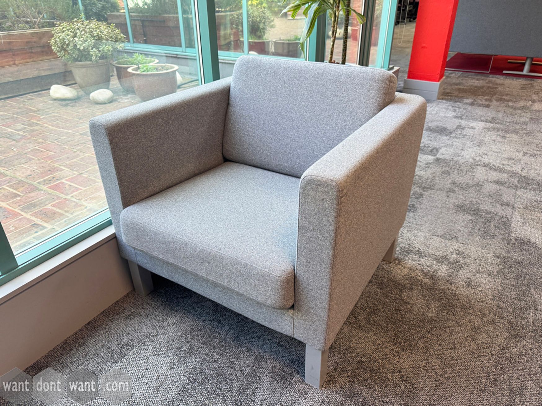 Used Kinnarps single armchairs in grey fabric
