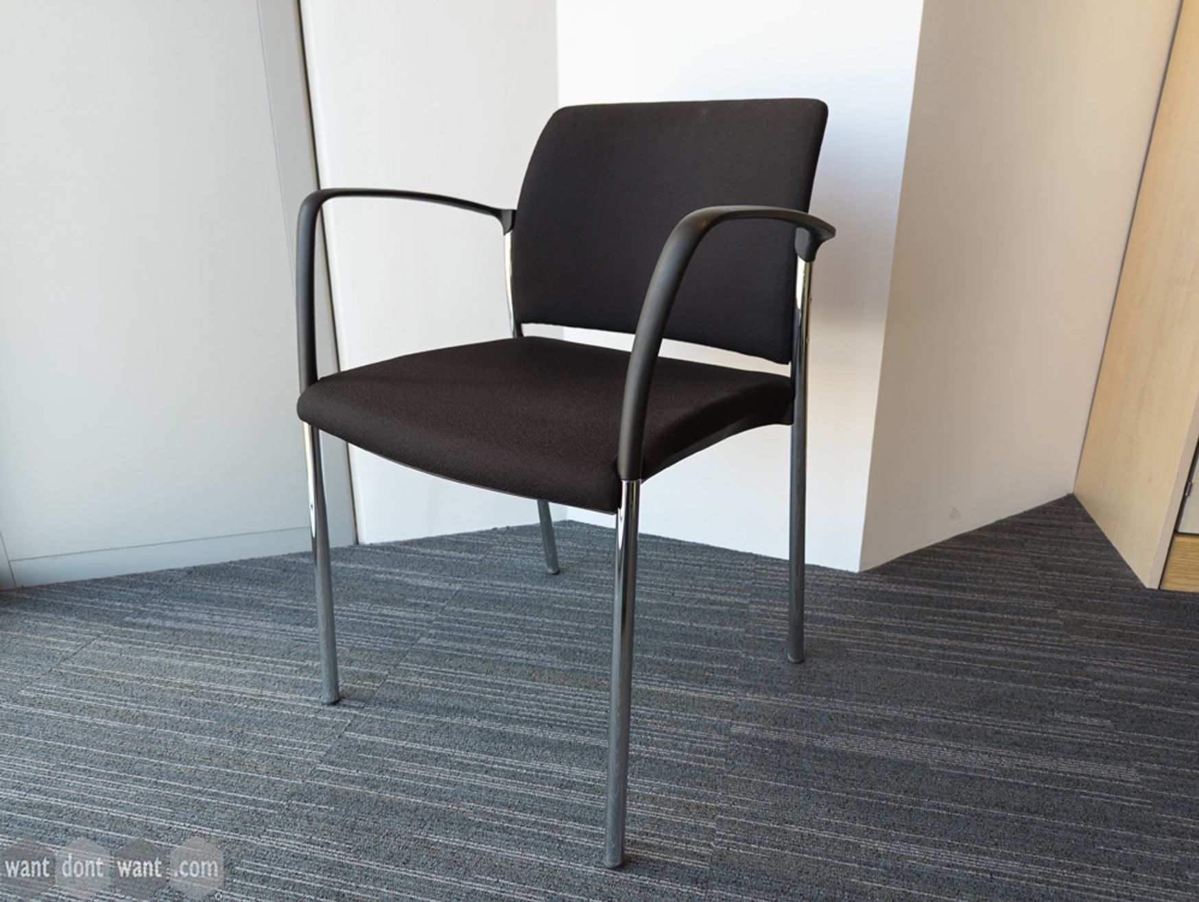 Used Komac chair in black fabric