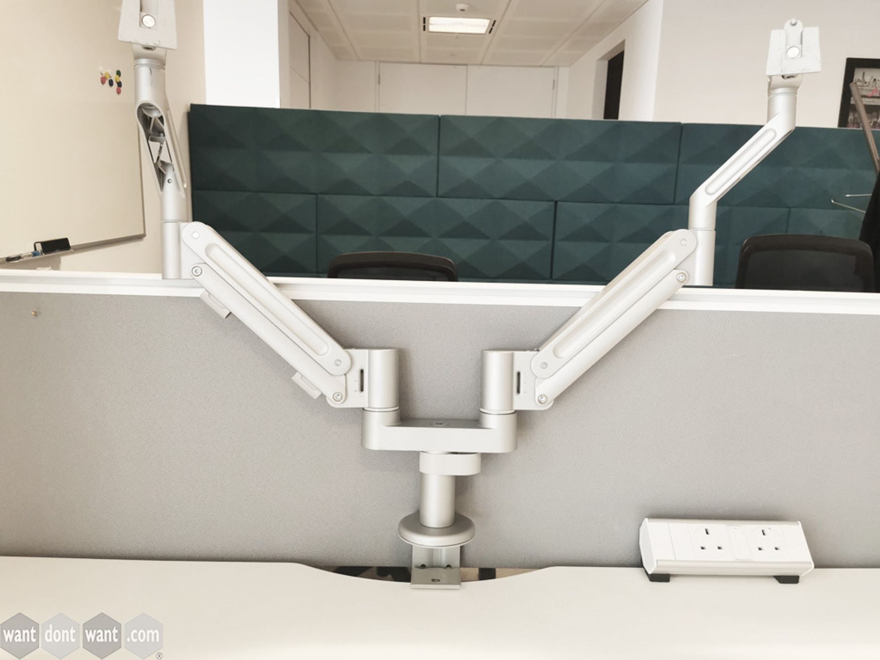 Used Teknion Twin Monitor Arms with Desk Clamp