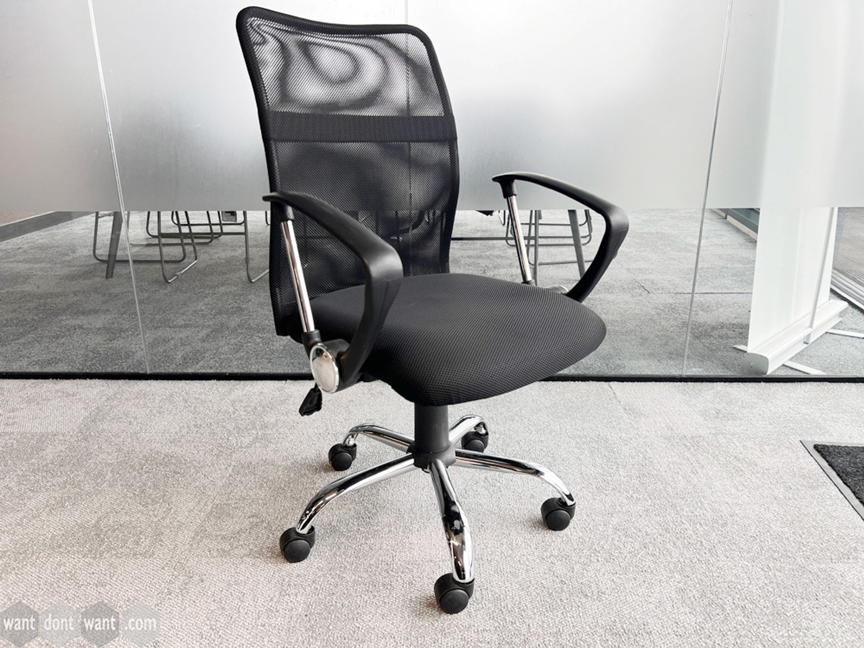 Used task chairs with mesh back and arms.