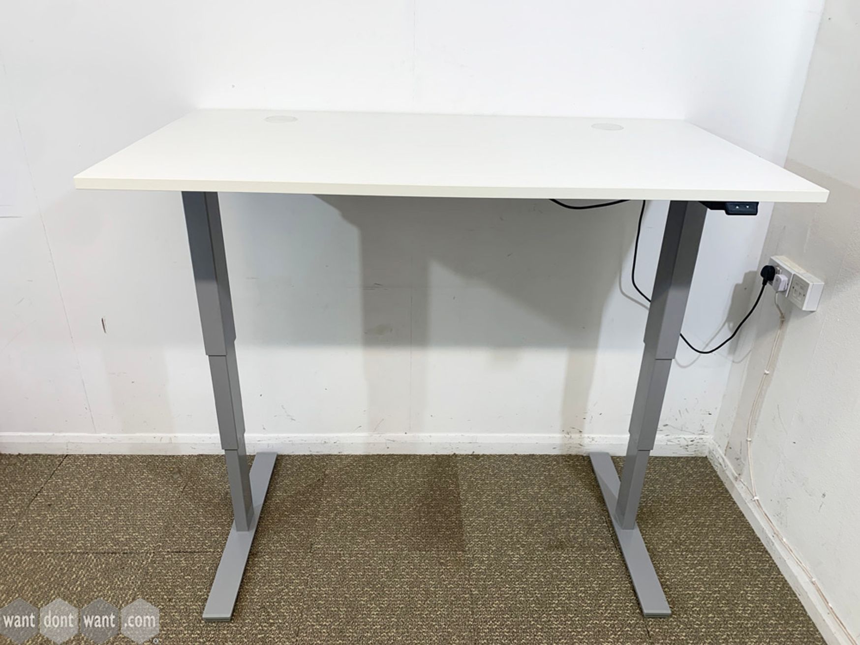Never used white electric Sit/Stand desks with light grey frames and 2 x cable ports.