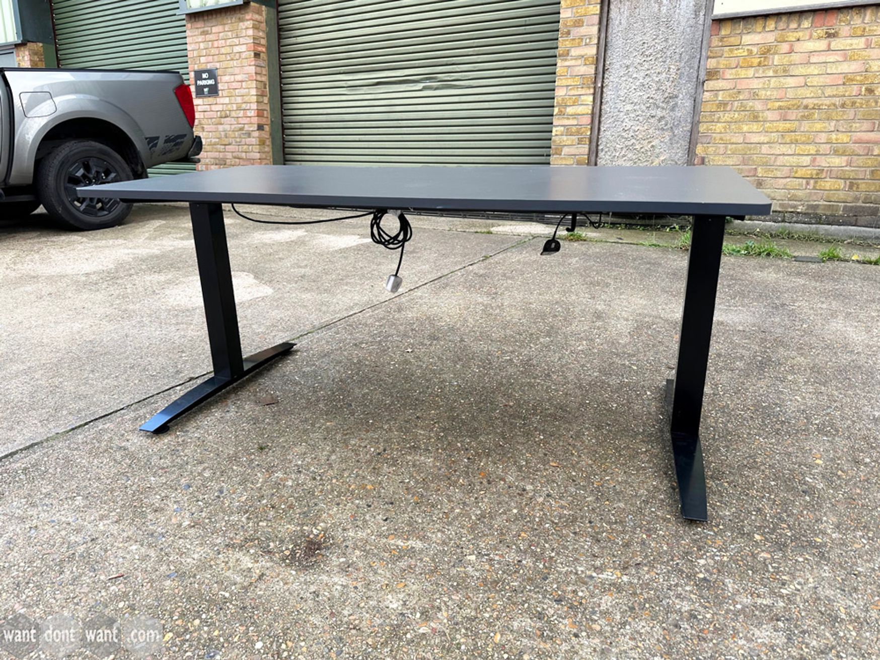 Used 1600mm electric 'Sit-Stand' desk with dark grey top