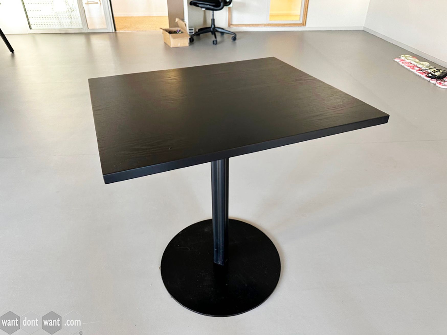 Used 700mm black cafe tables with black column base.