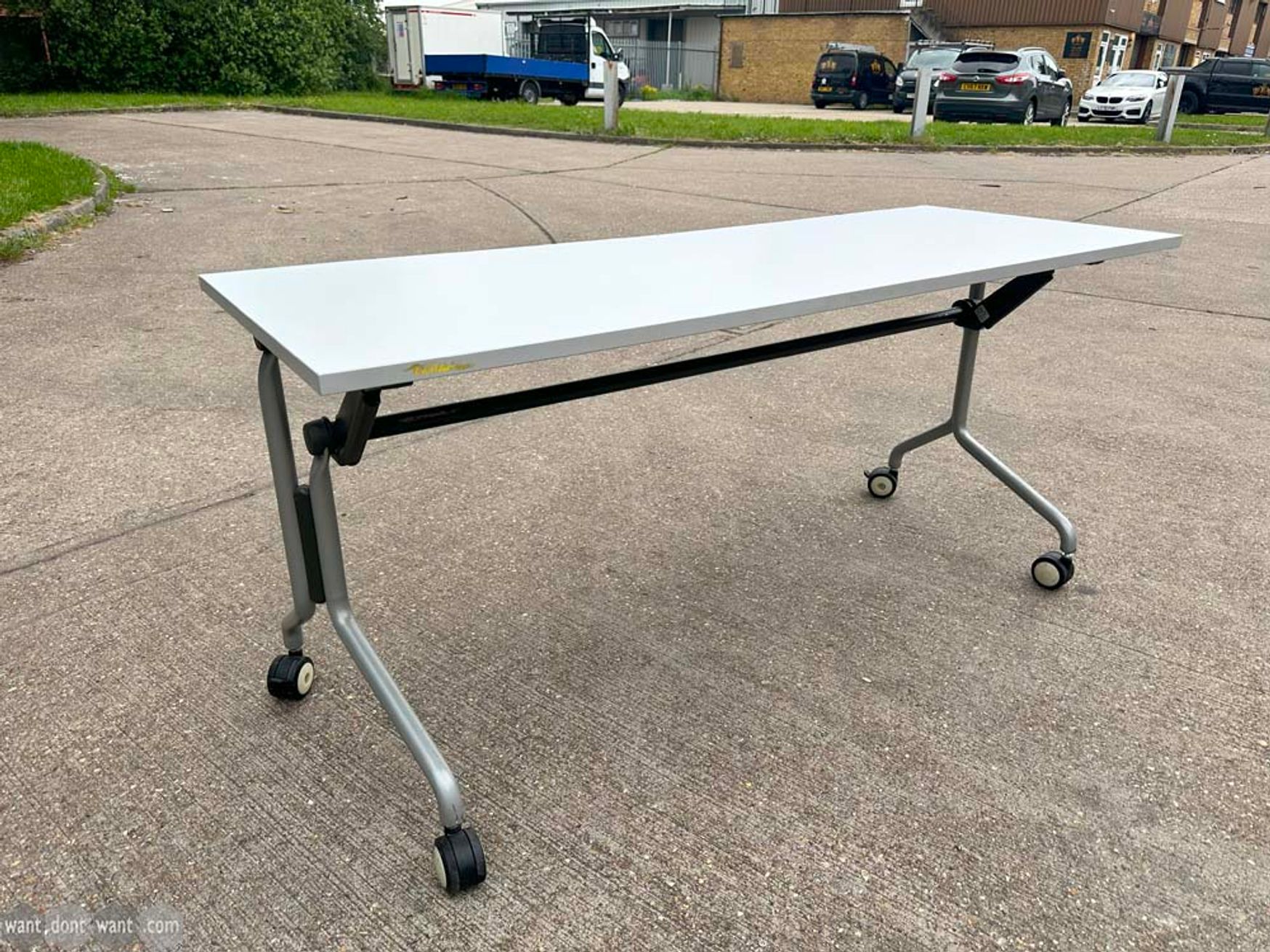Used light grey flip top tables