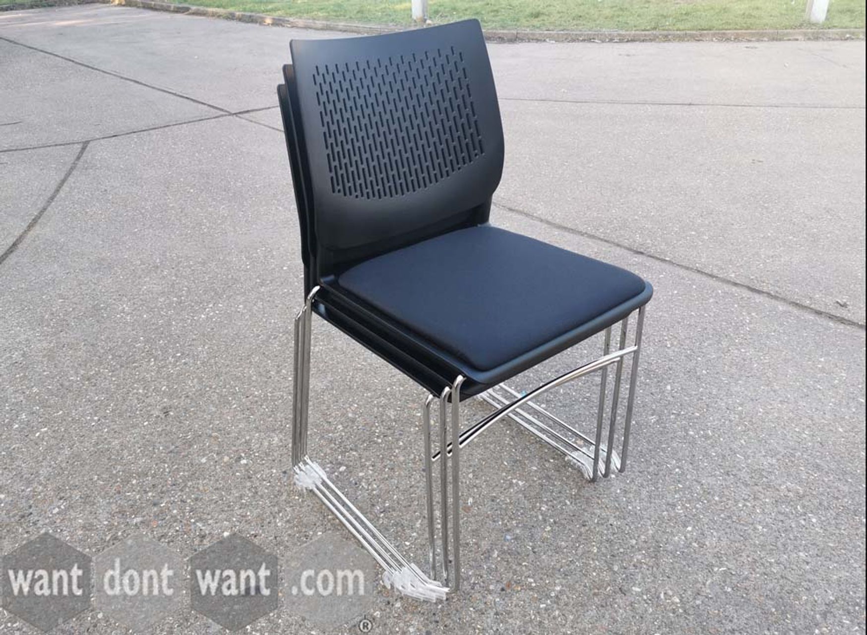 Used Pledge stacking chairs with upholstered seat pads