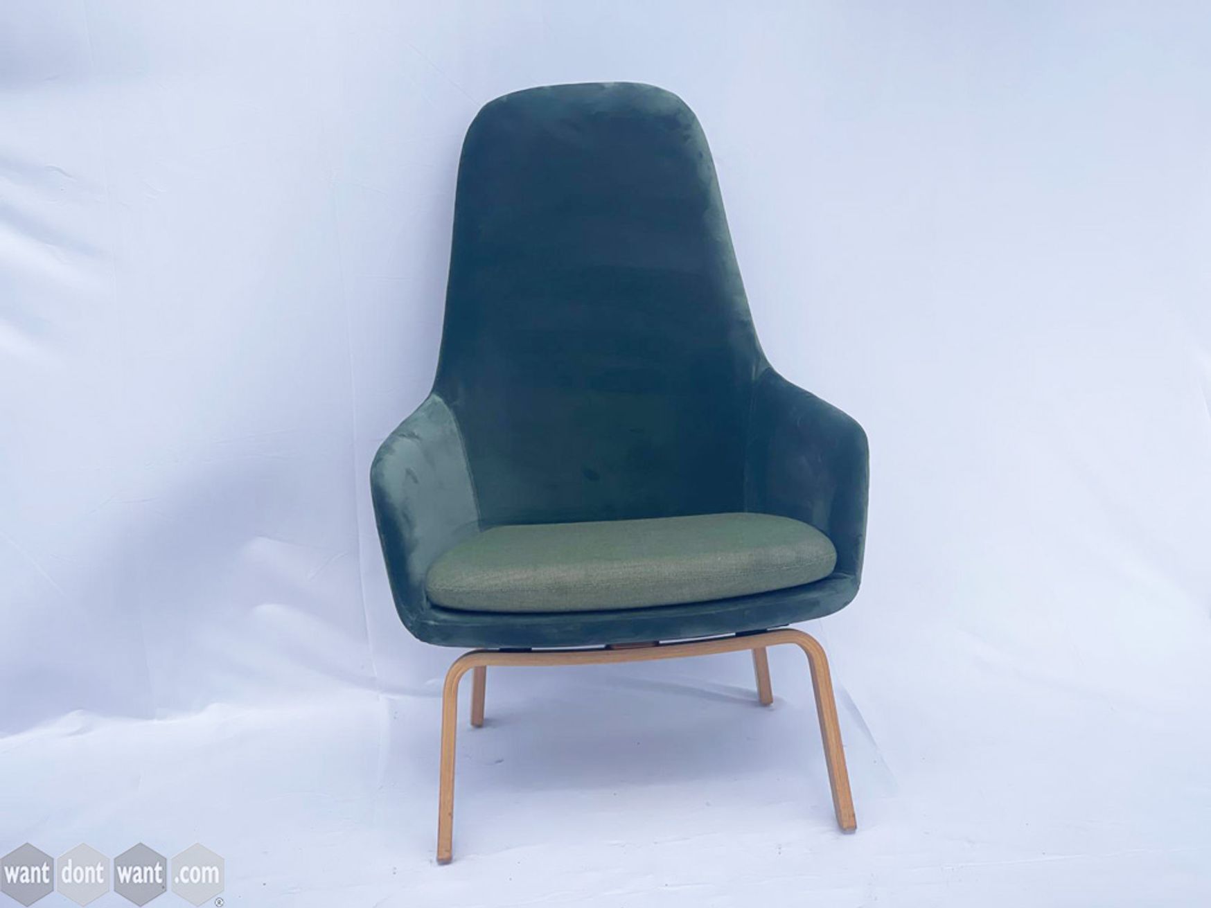 Used 'Sits' armchair upholstered in green velvet fabric.