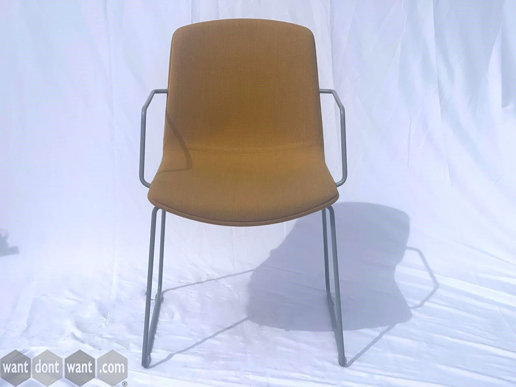Orangebox Cubb armchair with wire frame.