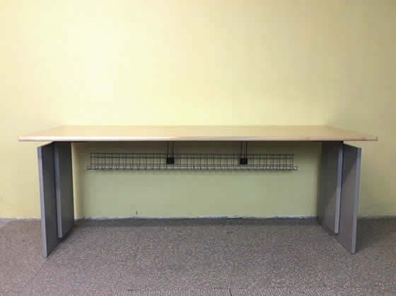 Further view of the panel ended desks shown in the previous image.
