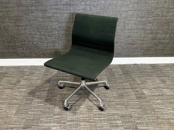 Used Eames ICF chairs on castors in black fabric