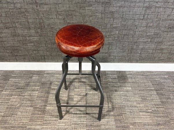 Used height adjustable leather stool