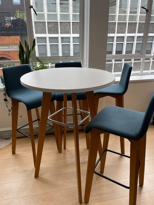 Used 600mm circular high table with wooden legs