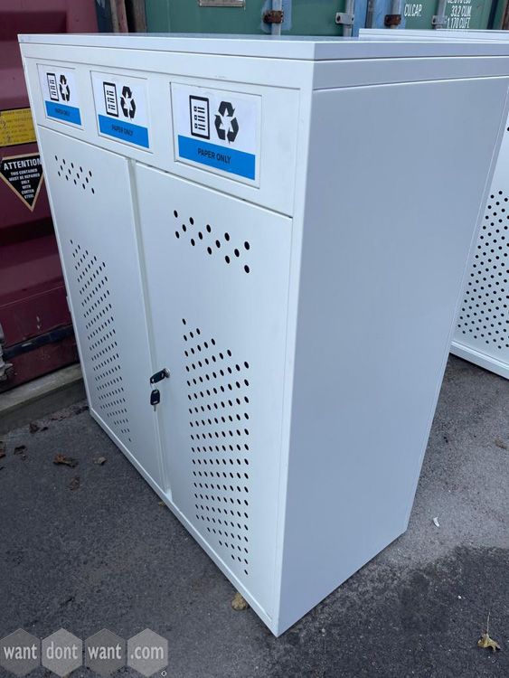 Used white recycling cupboards with white perforated doors.