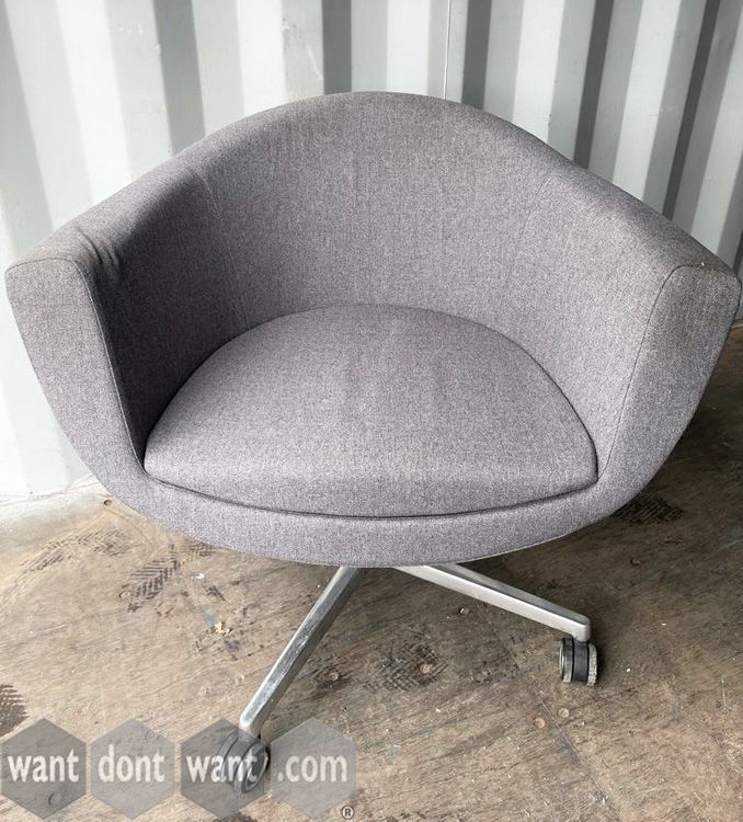 Used grey Profim swivel armchairs