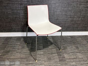 Used Arper Catifa 46 stacking chair with red back