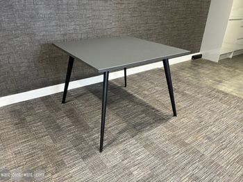 Used 1000mm Workstories 'Air' square table with grey top and black legs