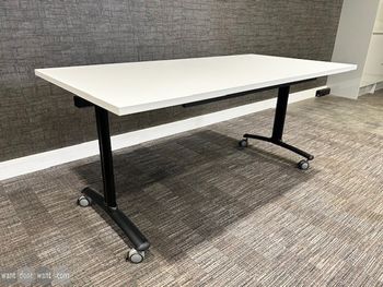 Used 1600mm Gresham flip top tables with white tops and black frame