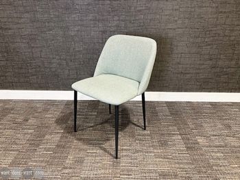 Used Workstories chair in green 
