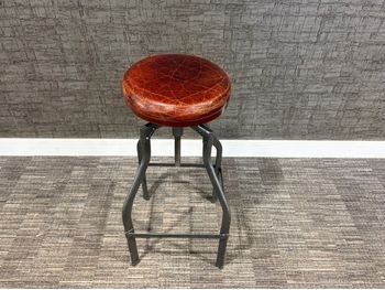Used height adjustable leather stool