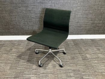 Used Eames ICF chairs on castors in black fabric