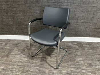 Used Boss grey leather cantilever chairs
