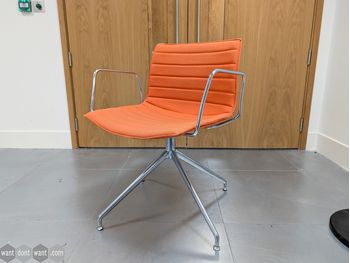 Used Arper chair in orange