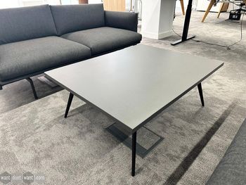 Used coffee table with grey top and black legs