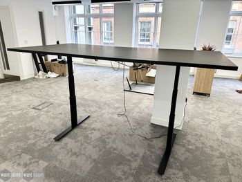 Used 2400mm height adjustable sit stand meeting table in black finish
