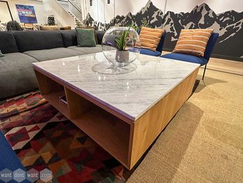 Used 1200mm marbled topped coffee table on wheels