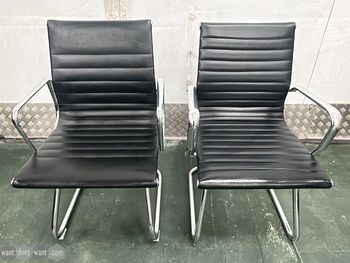 Used Eames style meeting chair on cantilever base with arms