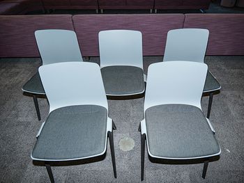 Used Brunner meeting chair with grey upholstered seat