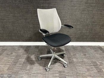 Used Humanscale Liberty chairs with black fabric seat pads