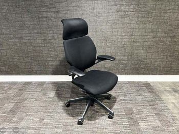 Used Humanscale Freedom chairs with headrests upholstered in black fabric