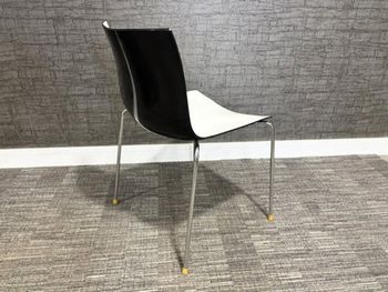 Used Arper Catifa stacking chairs with black back