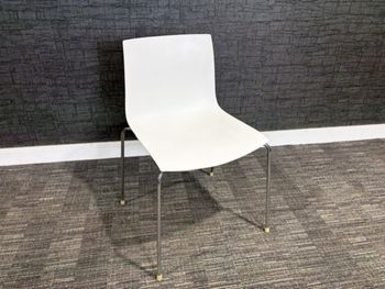 Used Arper Catifa white stacking chairs 