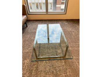 Used Glass Coffee Table with Chrome Frame - make unknown