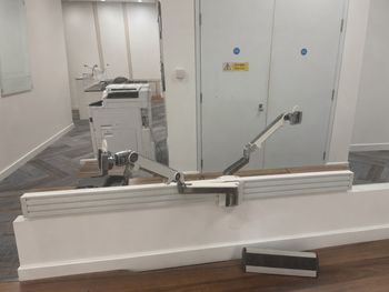 Used Humanscale twin monitor arms