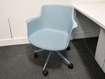 Used B&T light blue chair on castors 