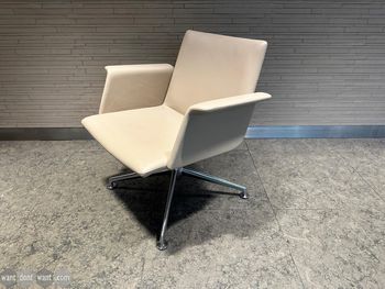 Used Brunner cream leather swivel armchair