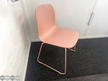 Used pink wooden chair