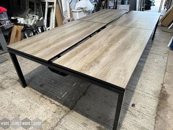 Used 1600mm bench desks with oak tops and black legs